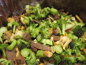 A crockpot full of beef, broccoli and mushrooms from the farm.